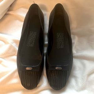 Ferragamo black flats in excellent condition
